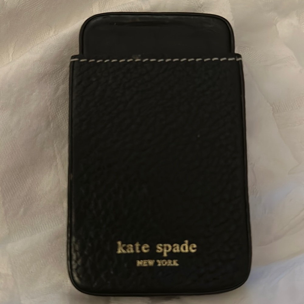 Black leather business card holder.